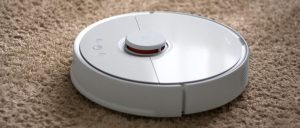 Robot vacuum cleaning a floor