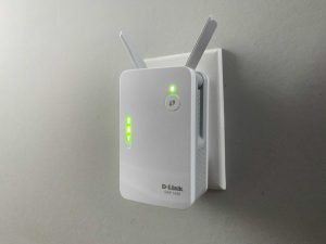 Wi-Fi range extender placed on a table