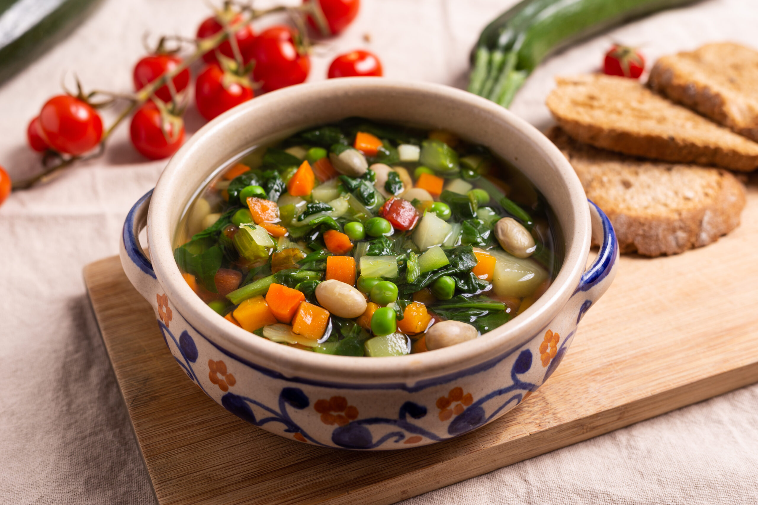 Italian minestrone soup with beans, pasta, and tomato broth