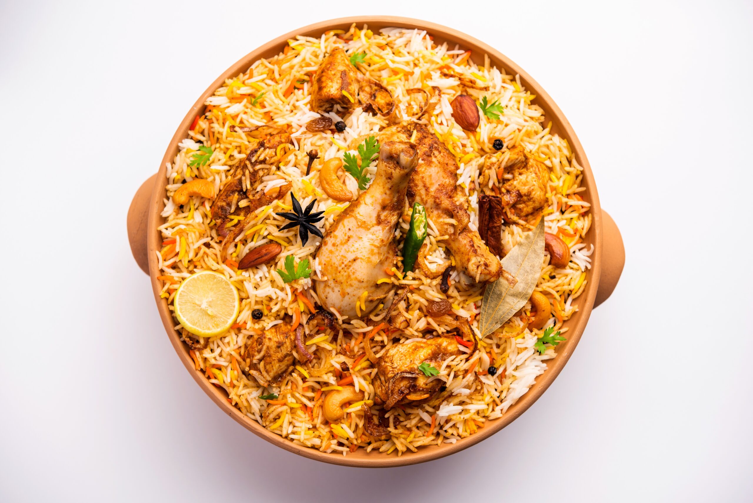 Indian biryani with marinated meat, spices, and basmati rice